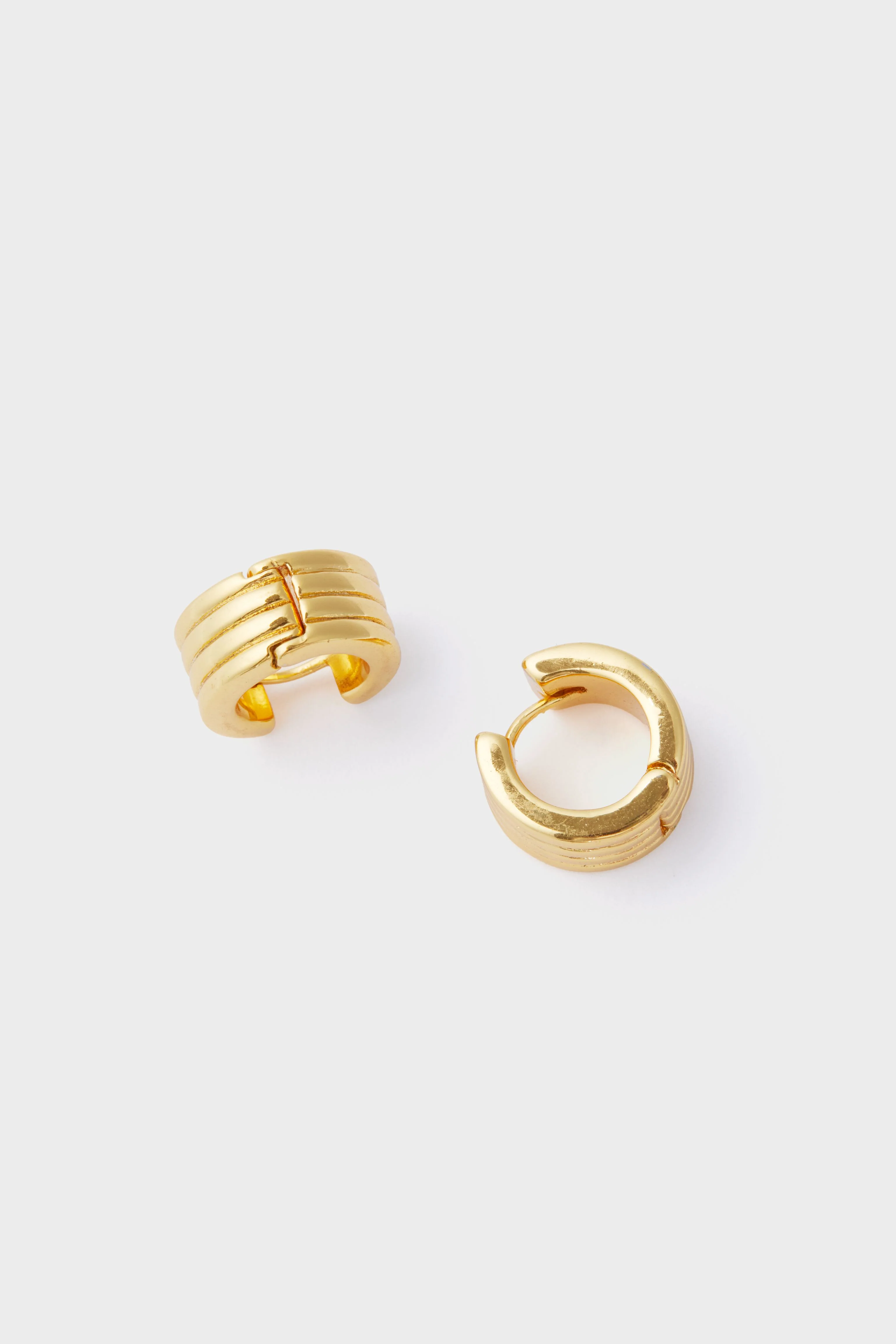 Gold Infinity Huggie Earrings - Image 4