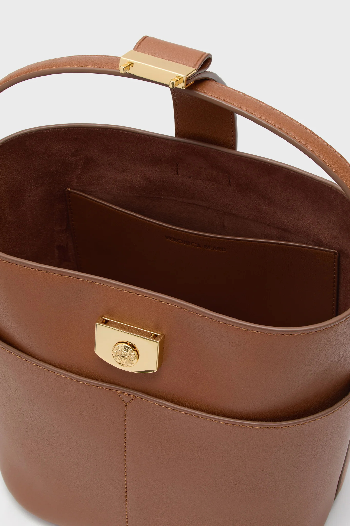 Hazelwood Small Crest Lock Bucket Bag - Image 5