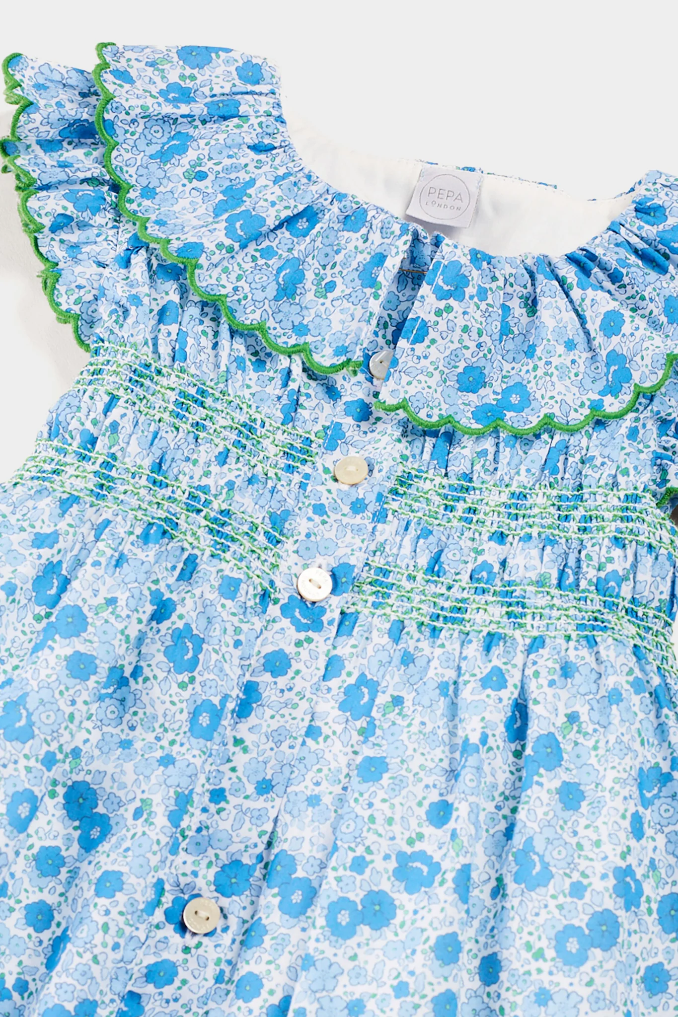 Olivia Floral Smocked Ruffle Collar Sleeveless Dress in Blue - Image 3